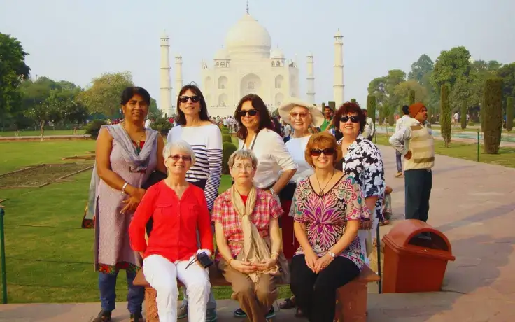 Golden Triangle Tour with Rajasthan – Foreigner group clicking photo at Taj Mahal during sunrise