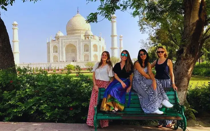 Girls group at the Taj Mahal enjoying Taj Mahal Day Tour with Fatehpur Sikri by Car by Namaste Yatra Tours