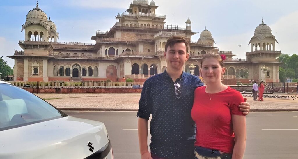 Couple exploring Jaipur heritage building during Golden Triangle Tour 4 Days