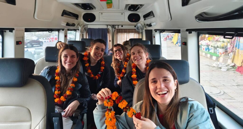 Tour bus with travelers on the Golden Triangle Tour with Ranthambore by Namaste Yatra Tours